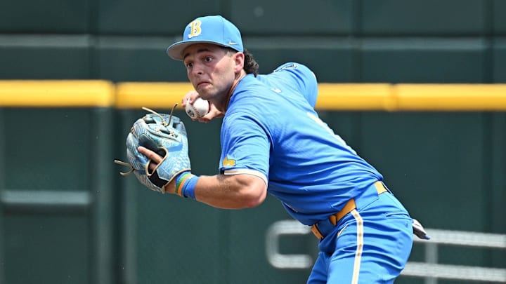 Jun 14, 2025; Omaha, Neb, USA; UCLA Bruins shortstop Roch Cholowsky (1) completes a double play against the Murray State Racers during the second inning at Charles Schwab Field. Mandatory Credit: Steven Branscombe-Imagn Images Jun 14, 2025; Omaha, Neb, USA; UCLA Bruins shortstop Roch Cholowsky (1) completes a double play against the Murray State Racers during the second inning at Charles Schwab Field. Mandatory Credit: Steven Branscombe-Imagn Images
