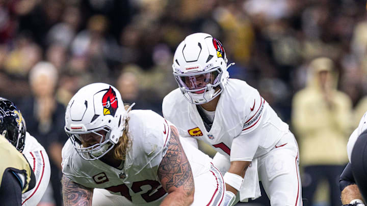 Sep 7, 2025; New Orleans, Louisiana, USA;  Arizona Cardinals guard Hjalte Froholdt (72) hikes the ball to quarterback Kyler Murray (1) against the New Orleans Saints at Caesars Superdome. Mandatory Credit: Stephen Lew-Imagn Images