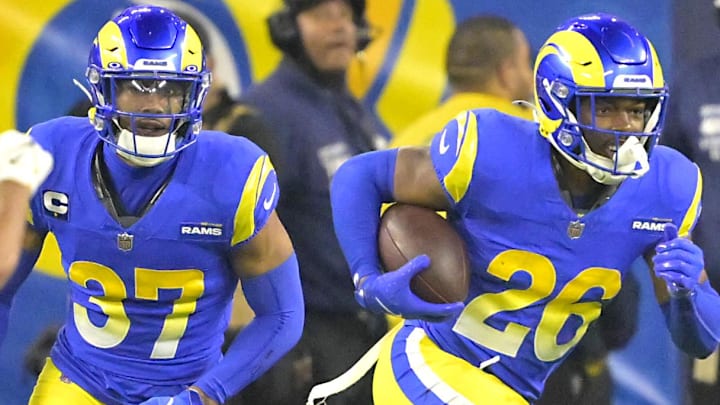Dec 28, 2024; Inglewood, California, USA; Los Angeles Rams safety Kamren Kinchens (26) celebrates after an interception in the end zone in the second half against the Arizona Cardinals at SoFi Stadium. Mandatory Credit: Jayne Kamin-Oncea-Imagn Images Dec 28, 2024; Inglewood, California, USA; Los Angeles Rams safety Kamren Kinchens (26) celebrates after an interception in the end zone in the second half against the Arizona Cardinals at SoFi Stadium. Mandatory Credit: Jayne Kamin-Oncea-Imagn Images