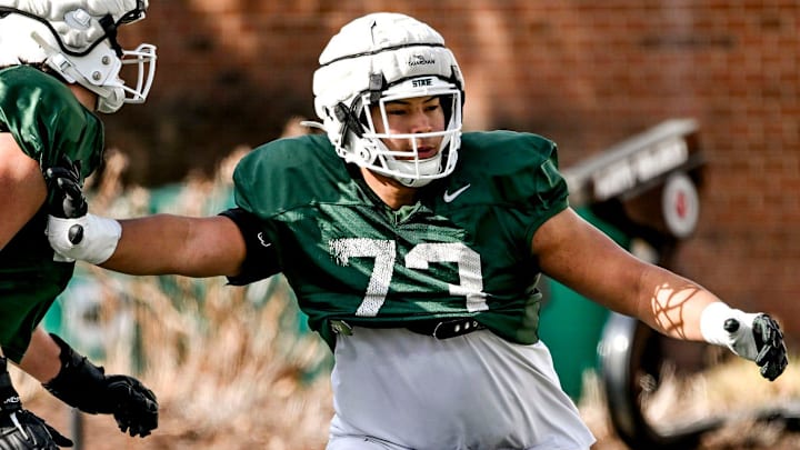 Michigan State offensive lineman Rustin Young, right, and Stanton Ramil work out during football practice on Tuesday, April 8, 2025, in East Lansing. Michigan State offensive lineman Rustin Young, right, and Stanton Ramil work out during football practice on Tuesday, April 8, 2025, in East Lansing.
