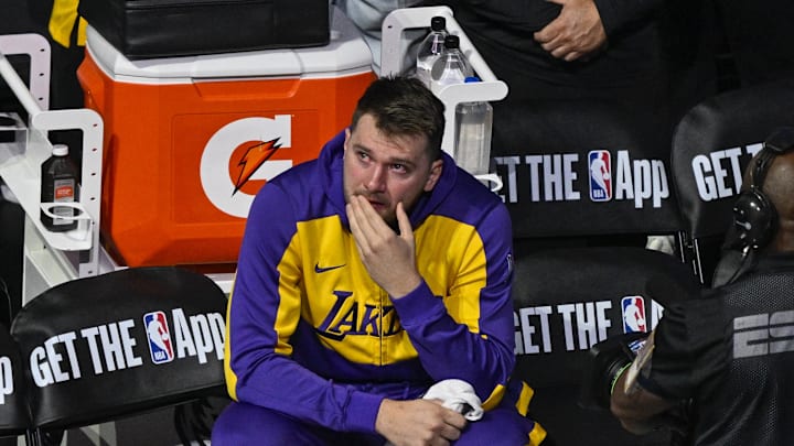 Apr 9, 2025; Dallas, Texas, USA; Los Angeles Lakers guard Luka Doncic (77) looks on as the Dallas Mavericks play a tribute video for Doncic before the game against the Lakers at the American Airlines Center. Mandatory Credit: Jerome Miron-Imagn Images
