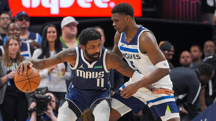 Oct 29, 2024; Minneapolis, Minnesota, USA; Dallas Mavericks guard Kyrie Irving (11) dribbles against the Minnesota Timberwolves guard Anthony Edwards (5) in the first quarter at Target Center. Oct 29, 2024; Minneapolis, Minnesota, USA; Dallas Mavericks guard Kyrie Irving (11) dribbles against the Minnesota Timberwolves guard Anthony Edwards (5) in the first quarter at Target Center.