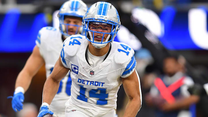 Detroit Lions WR Amon-Ra St. Brown (14) celebrates after a touchdown during the second quarter against the Rams