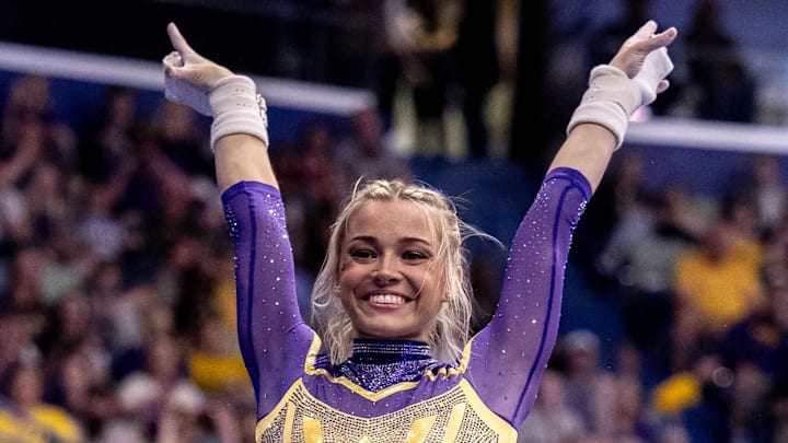 LSU Tigers Olivia Dunne performs on the uneven bars during the SEC Gymnastics Championship at Smoothie King Center. LSU Tigers Olivia Dunne performs on the uneven bars during the SEC Gymnastics Championship at Smoothie King Center.