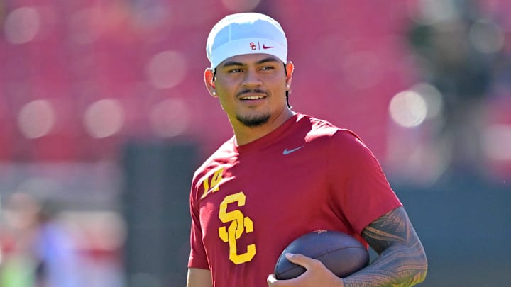 Oct 11, 2025; Los Angeles, California, USA; USC Trojans quarterback Jayden Maiava (14) warms up prior to the game against the Michigan Wolverines at United Airlines Field at the Los Angeles Memorial Coliseum. Mandatory Credit: Jayne Kamin-Oncea-Imagn Images Oct 11, 2025; Los Angeles, California, USA; USC Trojans quarterback Jayden Maiava (14) warms up prior to the game against the Michigan Wolverines at United Airlines Field at the Los Angeles Memorial Coliseum. Mandatory Credit: Jayne Kamin-Oncea-Imagn Images