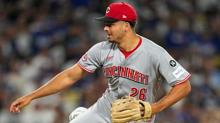 Chase Burns (26) throws a pitch 