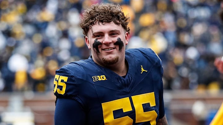 Blue Team defensive lineman Mason Graham (55) walks up the tunnel for halftime during the spring game at Michigan Stadium in Ann Arbor on Saturday, April 20, 2024.