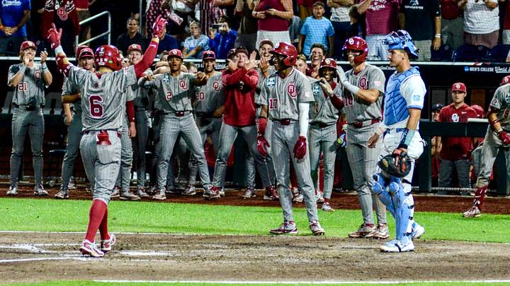 Oklahoma infielder Kyle Branch celebrates after hitting a home run against UNC in the CWS Finals.