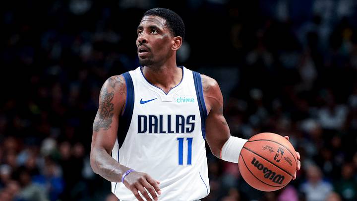 Feb 27, 2025; Dallas, Texas, USA;  Dallas Mavericks guard Kyrie Irving (11) controls the ball against the Charlotte Hornets during the second half at American Airlines Center. Mandatory Credit: Kevin Jairaj-Imagn Images