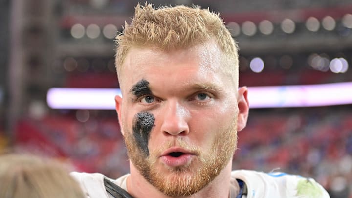 Detroit Lions defensive end Aidan Hutchinson (97) is interviewed after beating the Arizona Cardinals Detroit Lions defensive end Aidan Hutchinson (97) is interviewed after beating the Arizona Cardinals