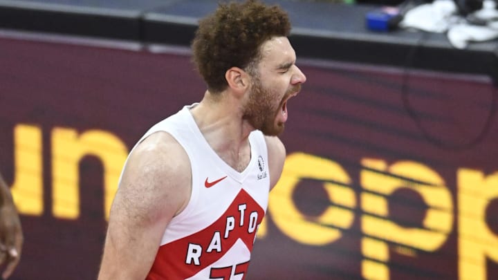 Oct 31, 2025; Cleveland, Ohio, USA; Toronto Raptors forward Jamison Battle (77) celebrates his three-point basket in the fourth quarter against the Cleveland Cavaliers at Rocket Arena. Mandatory Credit: David Richard-Imagn Images