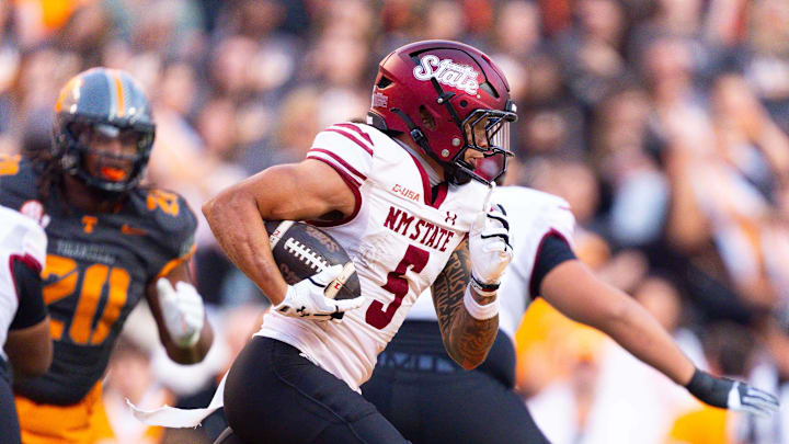 Donovan Faupel 5 of the New Mexico State Aggies runs the ball during the NCAA, College League, USA football game between the University of Tennessee Volunteers and the New Mexico State University Aggies at Neyland Stadium, Knoxville.