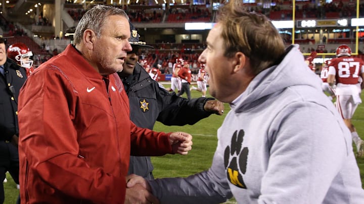 Arkansas Razorbacks coach Sam Pittman shakes hands with Missouri Tigers coach Eil Drinkwitz after the game at Donald W. Reynolds Razorbacks Stadium. Arkansas won 34-17.