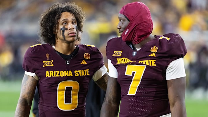 Nov 28, 2025; Tempe, Arizona, USA; Arizona State Sun Devils wide receiver Jordyn Tyson (0) with tight end Chamon Metayer (7) against the Arizona Wildcats during the 99th Territorial Cup at Mountain America Stadium. Mandatory Credit: Mark J. Rebilas-Imagn Images