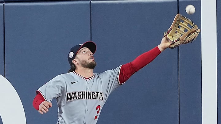 Apr 2, 2025; Toronto, Ontario, CAN; Washington Nationals centre fielder Dylan Crews (3) attempts to catch a fly ball against the Toronto Blue Jays during the second inning at Rogers Centre.