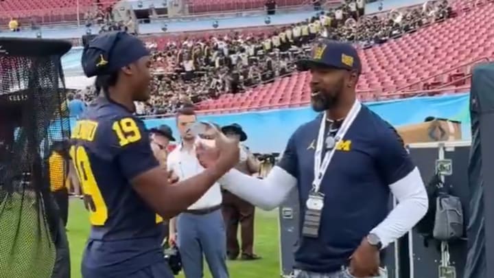 Bryce Underwood and Charles Woodson
