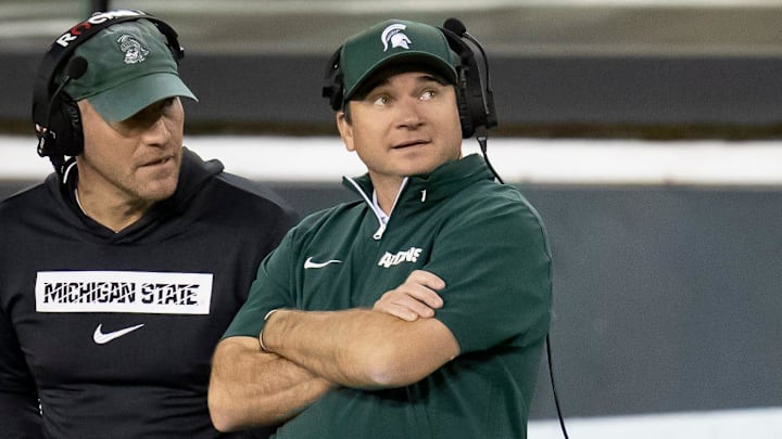 Michigan State Spartans head coach Jonathan Smith looks toward the scoreboard during a timeout as the Ducks host the Spartans Friday, Oct. 4, 2024 at Autzen Stadium in Eugene, Ore. Michigan State Spartans head coach Jonathan Smith looks toward the scoreboard during a timeout as the Ducks host the Spartans Friday, Oct. 4, 2024 at Autzen Stadium in Eugene, Ore.