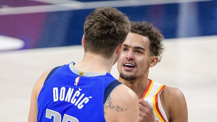Feb 10, 2021; Dallas, Texas, USA; Dallas Mavericks guard Luka Doncic (77) talks with Atlanta Hawks guard Trae Young (11) after the game at the American Airlines Center. Mandatory Credit: Jerome Miron-Imagn Images