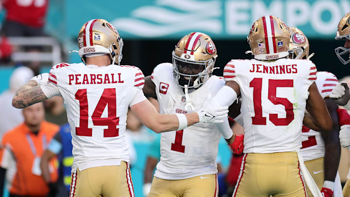 San Francisco 49ers wide receivers Ricky Pearsall (15), Deebo Samuel (1) and Jauan Jennings (15)