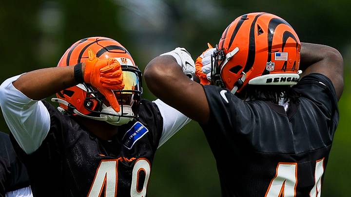 Jun 16, 2026; Cincinnati, OH, USA; Cincinnati Bengals linebacker Barrett Carter (49) gestures with linebacker Demetrius Knight Jr. (44) during minicamp at Kettering Health Practice Fields. Mandatory Credit: Katie Stratman-Imagn Images