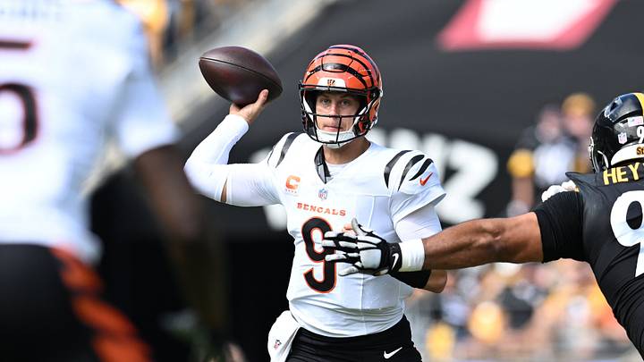 Sep 27, 2026; Pittsburgh, Pennsylvania, USA; Cincinnati Bengals quarterback Joe Burrow (9) scrambles against Pittsburgh Steelers defensive tackle Cameron Heyward (97) during the first quarter at Acrisure Stadium. Mandatory Credit: Barry Reeger-Imagn Images Sep 27, 2026; Pittsburgh, Pennsylvania, USA; Cincinnati Bengals quarterback Joe Burrow (9) scrambles against Pittsburgh Steelers defensive tackle Cameron Heyward (97) during the first quarter at Acrisure Stadium. Mandatory Credit: Barry Reeger-Imagn Images