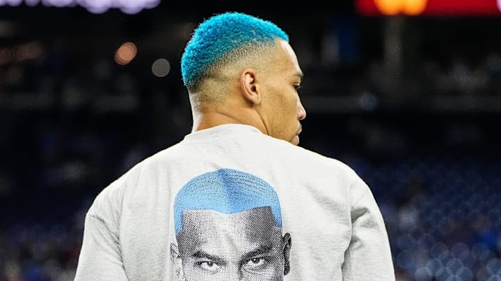 Detroit Lions wide receiver Amon-Ra St. Brown (14) warms up before the NFC divisional round at Ford Field
