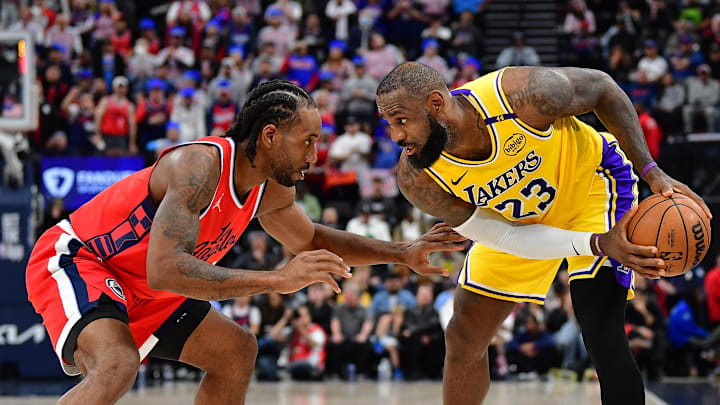 Feb 4, 2025; Inglewood, California, USA; Los Angeles Lakers forward LeBron James (23) controls the ball against Los Angeles Clippers forward Kawhi Leonard (2) during the second half at Intuit Dome. Mandatory Credit: Gary A. Vasquez-Imagn Images Feb 4, 2025; Inglewood, California, USA; Los Angeles Lakers forward LeBron James (23) controls the ball against Los Angeles Clippers forward Kawhi Leonard (2) during the second half at Intuit Dome. Mandatory Credit: Gary A. Vasquez-Imagn Images