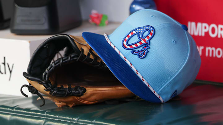 Jul 4, 2025; Atlanta, Georgia, USA; A detailed view of the Baltimore Orioles 4th of July hat in the dugout against the Atlanta Braves in the third inning at Truist Park. 