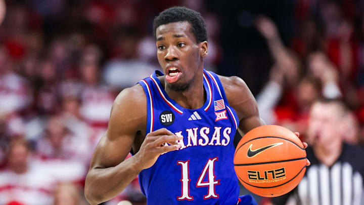 Kansas Jayhawks guard Melvin Council Jr. (14) dribbles against the Arizona Wildcats at McKale Memorial Center. 