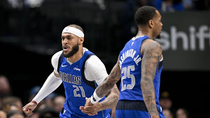 Mar 31, 2025; Dallas, Texas, USA; Dallas Mavericks center Daniel Gafford (21) and forward P.J. Washington (25) in action during the game between the Dallas Mavericks and the Brooklyn Nets at the American Airlines Center. Mandatory Credit: Jerome Miron-Imagn Images