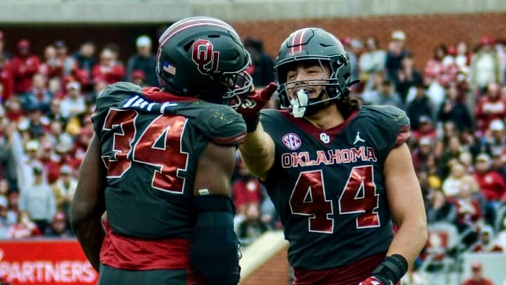 Oklahoma defensive ends Adepoju Adebawore, Taylor Wein