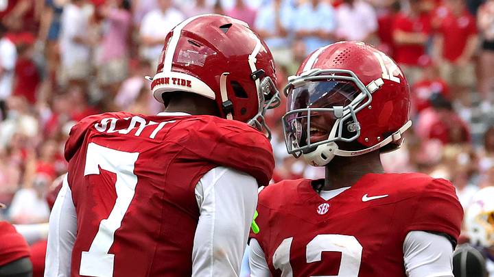 Sep 5, 2026; Tuscaloosa, Alabama, USA; Alabama Crimson Tide quarterback Keelon Russell (12) celebrates his touchdown run with teammate Alabama Crimson Tide wide receiver Rico Scott (7) during the second quarter against the East Carolina Pirates at Saban Field at Bryant-Denny Stadium. Mandatory Credit: David Leong-Imagn Images Sep 5, 2026; Tuscaloosa, Alabama, USA; Alabama Crimson Tide quarterback Keelon Russell (12) celebrates his touchdown run with teammate Alabama Crimson Tide wide receiver Rico Scott (7) during the second quarter against the East Carolina Pirates at Saban Field at Bryant-Denny Stadium. Mandatory Credit: David Leong-Imagn Images