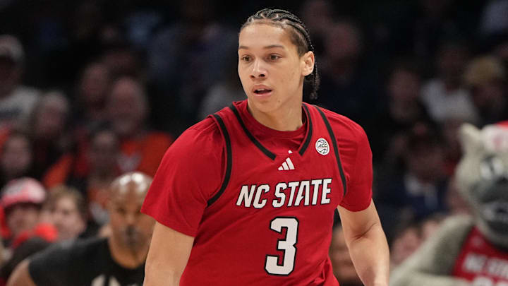 Mar 12, 2026; Charlotte, NC, USA; NC State Wolfpack guard Matt Able (3) brings the ball up the court in the first half at Spectrum Center. Mandatory Credit: Bob Donnan-Imagn Images