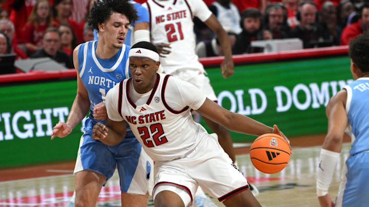Feb 17, 2026; Raleigh, North Carolina, USA; NC State Wolfpack forward Ven-Allen Lubin (22) drives the ball to the basket against North Carolina Tar Heels forward Zayden High (1) during the first half at Lenovo Center. Mandatory Credit: Zachary Taft-Imagn Images Feb 17, 2026; Raleigh, North Carolina, USA; NC State Wolfpack forward Ven-Allen Lubin (22) drives the ball to the basket against North Carolina Tar Heels forward Zayden High (1) during the first half at Lenovo Center. Mandatory Credit: Zachary Taft-Imagn Images