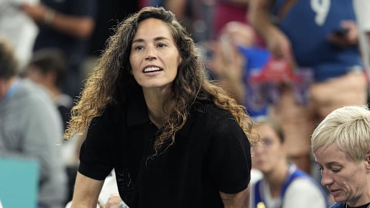 Aug 8, 2024; Paris, France; Sue Bird and Megan Rapinoe look on before the game between France and Germany in a men's basketball semifinal game during the Paris 2024 Olympic Summer Games at Accor Arena. Mandatory Credit: Kyle Terada-Imagn Images
