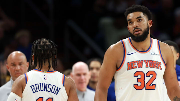 Jan 9, 2026; Phoenix, Arizona, USA; New York Knicks center Karl-Anthony Towns (32) and guard Jalen Brunson (11) against the Phoenix Suns at Mortgage Matchup Center. Mandatory Credit: Mark J. Rebilas-Imagn Images
