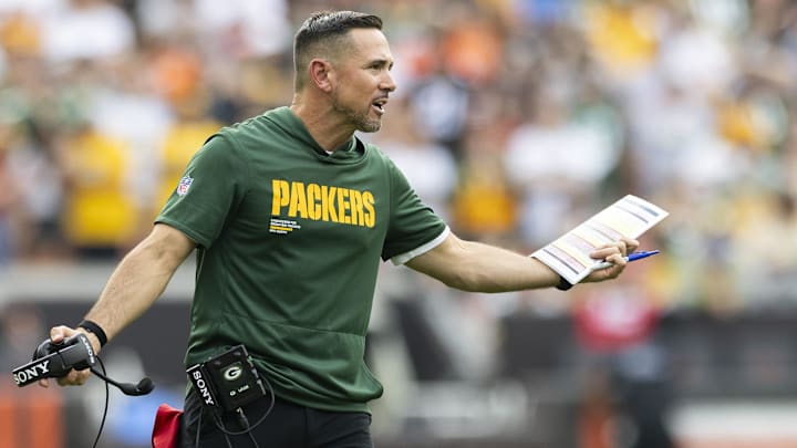 Sep 21, 2025; Cleveland, Ohio, USA; Green Bay Packers head coach Matt LaFleur argues a call with line judge Walt Coleman IV (65) during the fourth quarter at Huntington Bank Field.