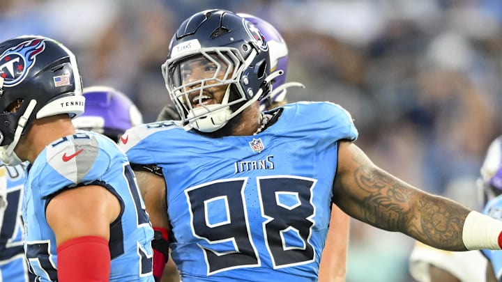 Aug 22, 2025; Nashville, Tennessee, USA;  Tennessee Titans defensive tackle Jeffery Simmons (98) celebrates the tackle for loss against the Minnesota Vikings during the first half at Nissan Stadium. Mandatory Credit: Steve Roberts-Imagn Images