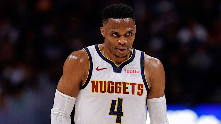 Oct 13, 2024; Denver, Colorado, USA; Denver Nuggets guard Russell Westbrook (4) in the second quarter against the Phoenix Suns at Ball Arena. Mandatory Credit: Isaiah J. Downing-Imagn Images