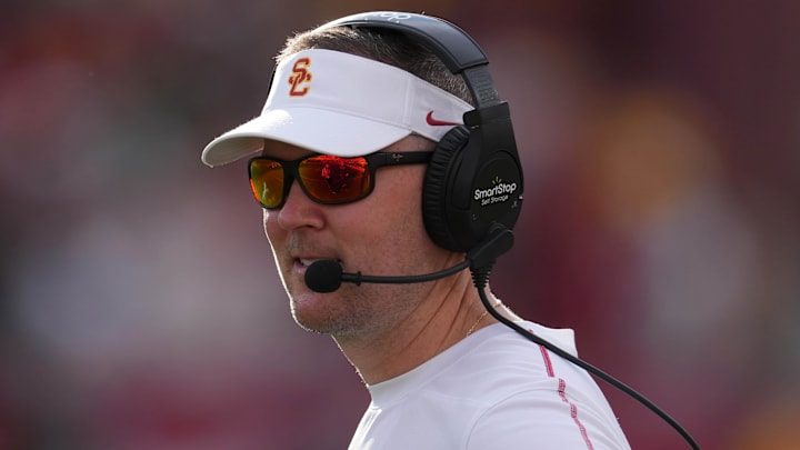 Nov 30, 2024; Los Angeles, California, USA; Southern California Trojans head coach Lincoln Riley reacts against the Notre Dame Fighting Irish in the second half at United Airlines Field at Los Angeles Memorial Coliseum. Mandatory Credit: Kirby Lee-Imagn Images