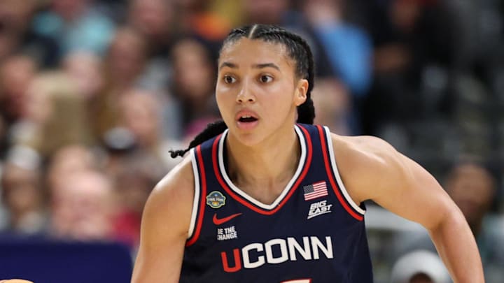 Apr 6, 2025; Tampa, FL, USA; Connecticut Huskies guard Azzi Fudd (35) dribbles the ball against the South Carolina Gamecocks during the first half of the national championship of the women's 2025 NCAA tournament at Amalie Arena. Mandatory Credit: Nathan Ray Seebeck-Imagn Images