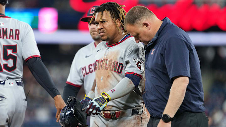 May 2, 2025; Toronto, Ontario, CAN; Cleveland Guardians third baseman Jose Ramirez (11) walks toward the dugout with a trainer after being hit with the ball and tripping over the first base against the Toronto Blue Jays during the third inning at Rogers Centre. Mandatory Credit: Nick Turchiaro-Imagn Images May 2, 2025; Toronto, Ontario, CAN; Cleveland Guardians third baseman Jose Ramirez (11) walks toward the dugout with a trainer after being hit with the ball and tripping over the first base against the Toronto Blue Jays during the third inning at Rogers Centre. Mandatory Credit: Nick Turchiaro-Imagn Images