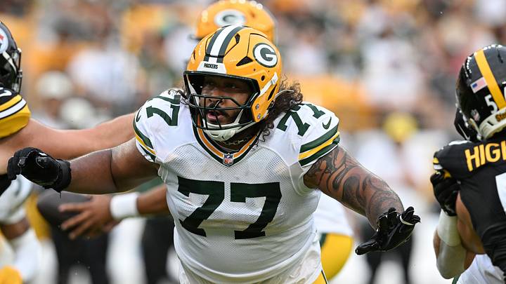 Green Bay Packers left tackle Jordan Morgan (77) looks to block against the Pittsburgh Steelers. Green Bay Packers left tackle Jordan Morgan (77) looks to block against the Pittsburgh Steelers.