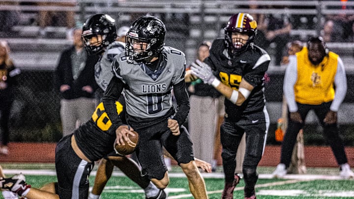 Lake Nona quarterback Luke Ramsey ran for two touchdowns to power the Lions past St. Cloud, 29-0, in a Class 7A, Region 3 quarterfinal on Nov. 14, 2025.