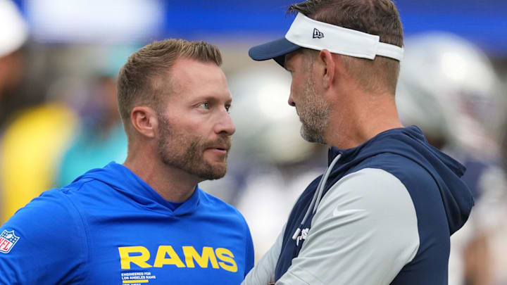 Aug 9, 2025; Inglewood, California, USA; Los Angeles Rams Sean McVay (left) talks with Dallas Cowboys coach Brian Schottenheimer during the game at SoFi Stadium. Mandatory Credit: Kirby Lee-Imagn Images