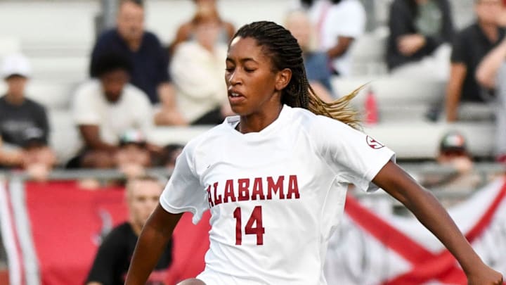Alabama forward Gianna Paul (14) takes a shot on goal. Alabama and Georgia played to a 1-1 tie at the Alabama Soccer Stadium Thursday, Sept. 14, 2023.