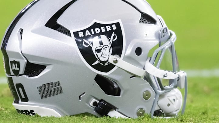 Aug 23, 2025; Glendale, Arizona, USA; Detailed view of a Las Vegas Raiders helmet during a preseason NFL game at State Farm Stadium. Mandatory Credit: Mark J. Rebilas-Imagn Images