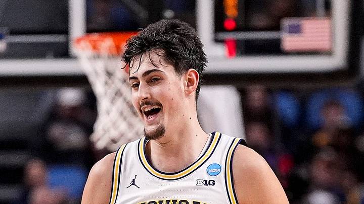Michigan center Aday Mara (15), center, celebrates a play against Saint Louis with guard Elliot Cadeau (3) during the first half of NCAA Tournament Second Round at KeyBank Center in Buffalo on Saturday, March 21, 2026.