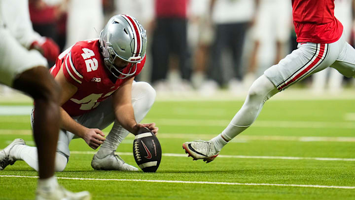 Ohio State Buckeyes kicker Jayden Fielding (38) kicks a field goal during the Big Ten Conference championship game against the Indiana Hoosiers at Lucas Oil Stadium in Indianapolis on Dec. 6, 2025. Ohio State lost 13-10.