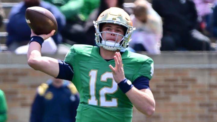 Apr 20, 2024; Notre Dame, IN, USA; Notre Dame Fighting Irish quarterback CJ Carr (12) throws in the Apr 20, 2024; Notre Dame, IN, USA; Notre Dame Fighting Irish quarterback CJ Carr (12) throws in the